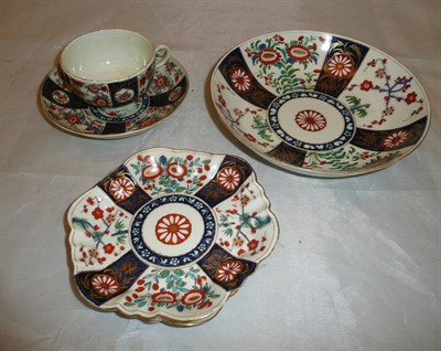 Lot 259 - An 18th century Worcester teacup and saucer, two saucers and a dish, with pseudo Chinese marks...