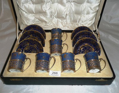 Lot 266 - A cased set of six Paragon silver mounted coffee cans and saucers with cracked ice decoration