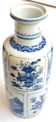 Lot 45 - A Chinese Porcelain Rouleau Vase, in Kangxi style, painted in underglaze blue with panels of...