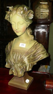 Lot 285 - A green tinted bust of a maiden in Art Nouveau style