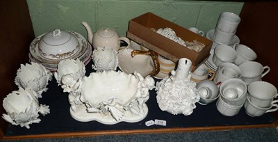 Lot 318 - Shelf of decorative ceramics including a Moore Bros cream porcelain encrusted centrepiece and...