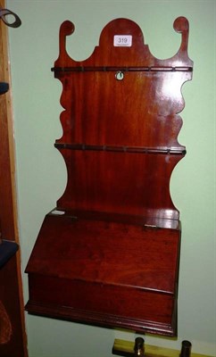 Lot 319 - Georgian mahogany spoon rack