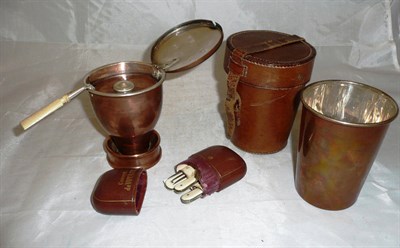 Lot 334 - A leather cased copper and plated brandy or chocolate warmer by A Barrett & Sons, Piccadilly,...