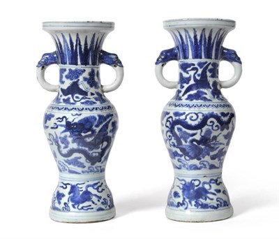 Lot 52 - A Pair of Chinese Provincial Porcelain Vases, 16th century, of baluster form with trumpet necks and