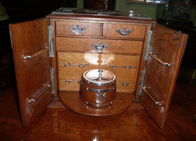 Lot 352 - * An oak smoker's cabinet