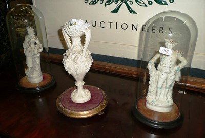 Lot 353 - Parian decorative vase and a pair of figures under glass domes