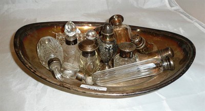 Lot 362 - A collection of silver mounted scents and condiments and a plated dish