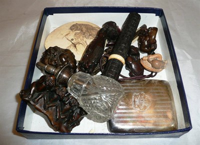 Lot 375 - A quantity of assorted netsuke, carvings, silver cigarette case etc