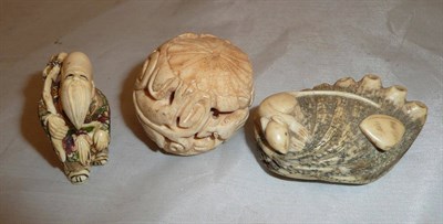 Lot 378 - Three carved ivory netsuke of two men and another, circa 1930