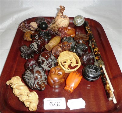 Lot 379 - A collection of assorted carved netsuke, an eating set etc