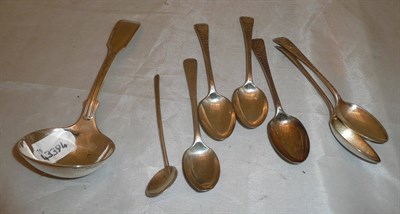 Lot 383 - A silver sauce ladle, set of five silver teaspoons and two other silver spoons