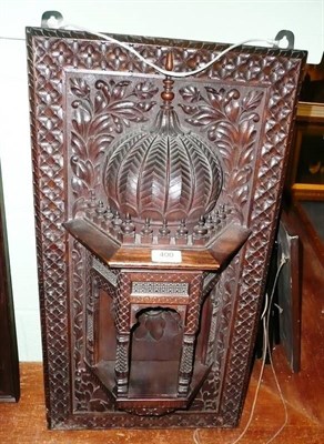 Lot 400 - An Indian carved wooden wall shrine