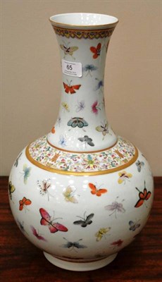Lot 65 - A Chinese Porcelain Bottle Vase, Guangxu reign mark but not of the period, painted in famille...