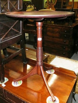 Lot 502 - A 19th century mahogany tripod table with turned column