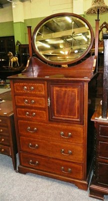 Lot 505 - An Edwardian mahogany and satinwood banded dressing chest/cupboard