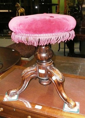 Lot 506 - * A Victorian rosewood revolving piano stool