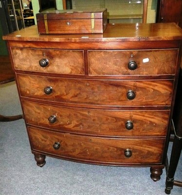 Lot 517 - A mahogany bow-front chest