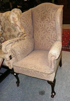 Lot 518 - * A 19th century wing back chair