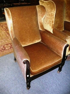 Lot 521 - * A 19th century mahogany framed wing back chair