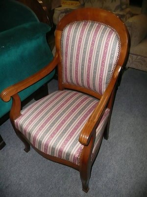 Lot 523 - French late Empire cherrywood fauteuil in striped fabric