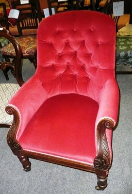 Lot 529 - A Victorian red velvet upholstered button back armchair