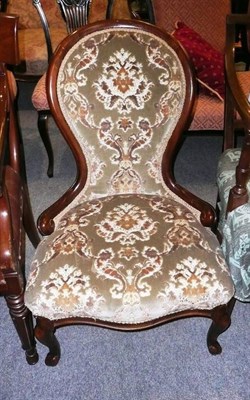 Lot 532 - A Victorian walnut-framed spoon-back nursing chair