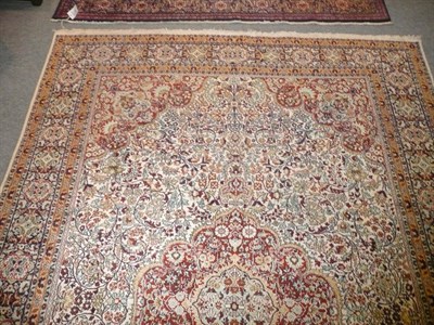 Lot 543 - Kashmir silk carpet North West India, the cream field richly decorated with scrolling vines centred