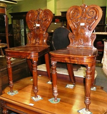 Lot 550 - * A pair of Victorian yew wood hall chairs