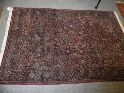 Lot 568 - Mashad rug Persian Khorasan, the deep raspberry field centred by flowerhead medallion