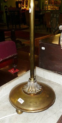 Lot 569 - A brass telescopic standard lamp