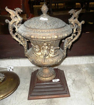 Lot 570 - * Large gilt metal two handled vase on mahogany plinth