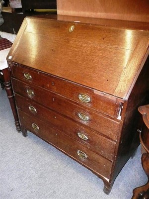 Lot 572 - * A Georgian oak bureau