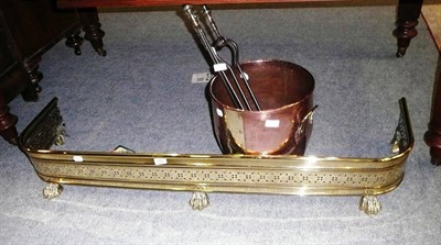 Lot 582 - Three brass fire irons, copper and brass coal bucket and a brass fender