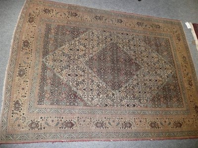 Lot 588 - Tabriz rug Persian Azerbaijan, the lozenge shaped field flanked by spandrels