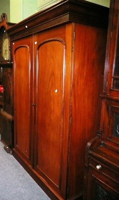 Lot 593 - * A Victorian mahogany double door wardrobe