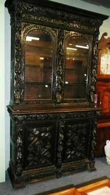 Lot 611 - * A large Victorian ebonised bookcase