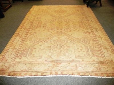 Lot 626 - Ushak design carpet, the cream field of geometric devices enclosed by borders of cruciform motifs