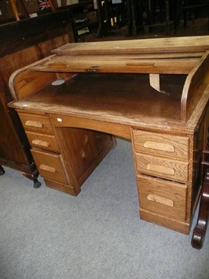 Lot 640 - Oak roll top desk