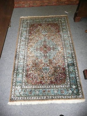 Lot 649 - Kashmir silk rug North West India, the camel field centred by turquoise medallion enclosed by...