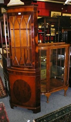 Lot 650 - Reproduction bow fronted corner cabinet and a glazed display cabinet