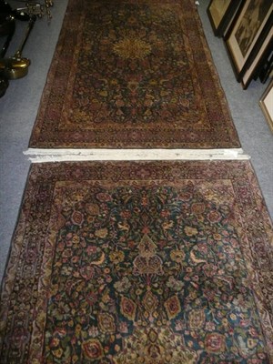 Lot 666 - A pair of Indian rugs, the mid indigo field of Ardabil design