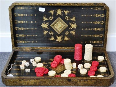 Lot 85 - A Chinese Lacquer Games Box, early 19th century, of hinged shaped rectangular form, the...