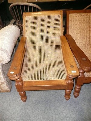 Lot 707 - Anglo-Indian planter's chair with open caning