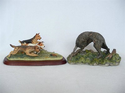 Lot 1023 - Border Fine Arts 'Terrier Race', model No. B0242 by Margaret Turner, 14cm high on wood base and...