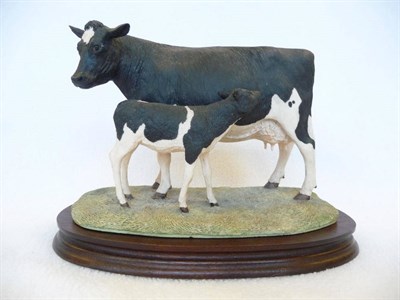 Lot 1038 - Border Fine Arts 'Friesian Cow and Calf', model No. L34 by Ray Ayres, Ltd. edition No. 717/850,...