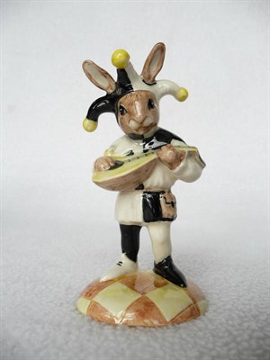 Lot 1057 - Royal Doulton Jester Bunnykins in black and white costume with yellow details model No. DB161,...