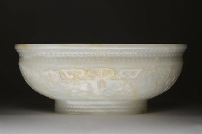 Lot 96 - A Chinese Pale Celadon Jade Bowl, Fanggu mark and period of Qianlong, of oval form carved with...