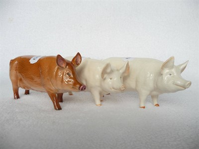 Lot 1075 - Royal Doulton Tamworth Pig, model No. model No. G215, brown/pink gloss, 7.6cm high; Two Beswick...