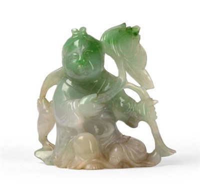 Lot 97 - A Chinese Jade Figure of a Boy, seated in flowing robes holding a flowering lotus, a...