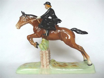 Lot 1085 - Beswick Huntswoman on Jumping Horse, model No. 982, brown horse, gloss, 25.4cm high